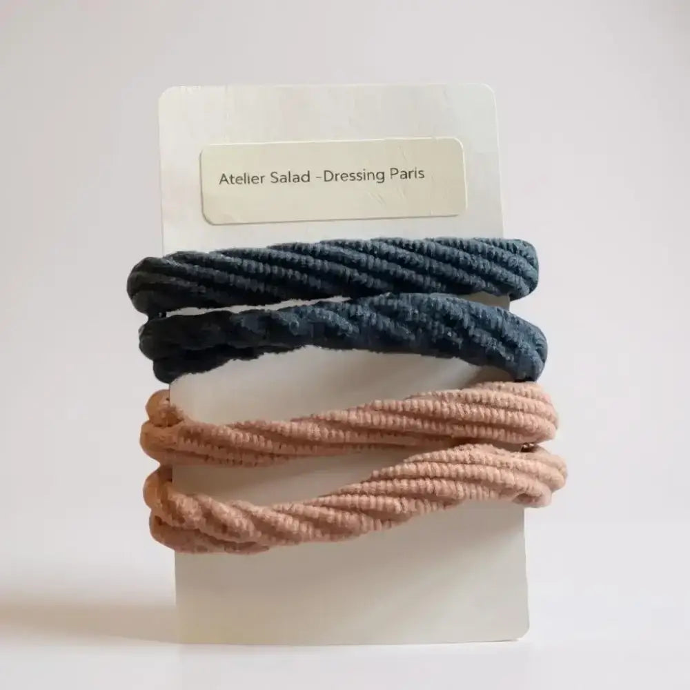 Accessoire cheveux coloré : lot d’élastiques rose et violet pour coiffures variées