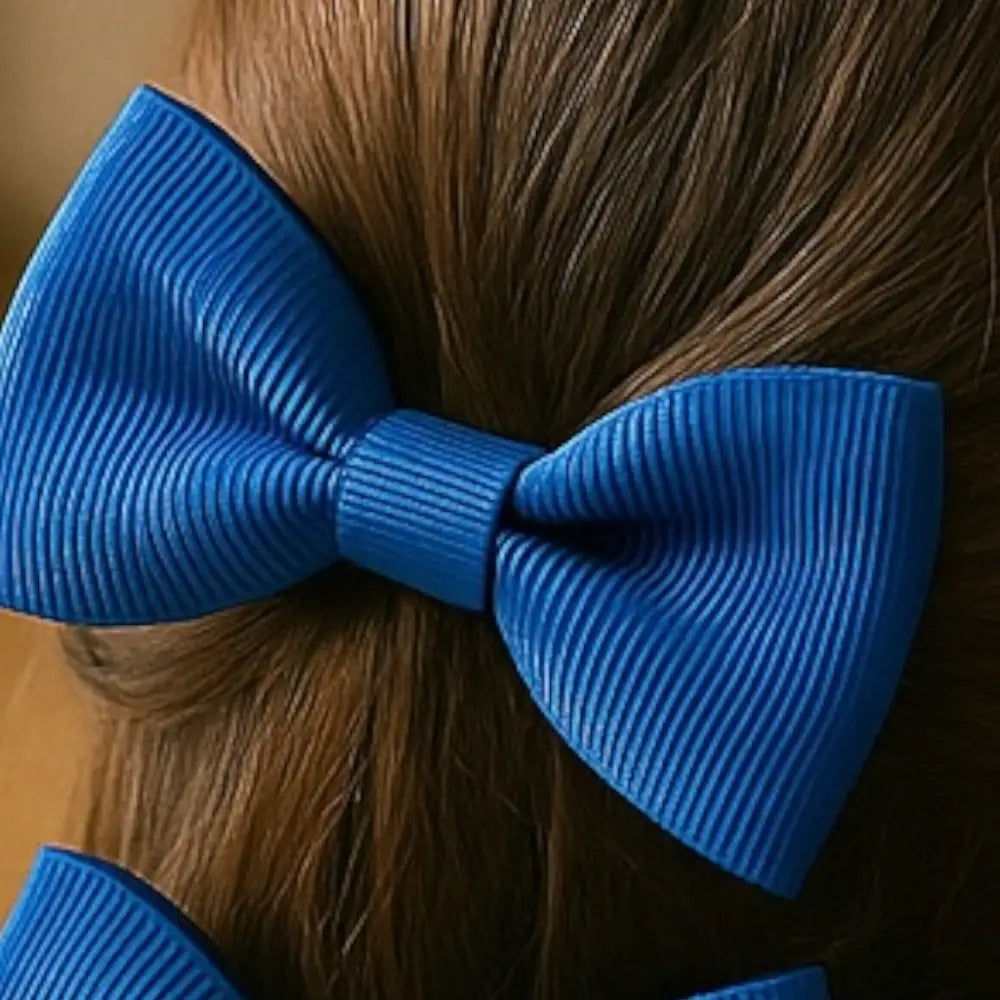 Élastiques Katya enfants nœud papillon bleu élégants et pratiques -