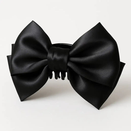 Pince à cheveux noire élégante pour femme avec nœud en satin