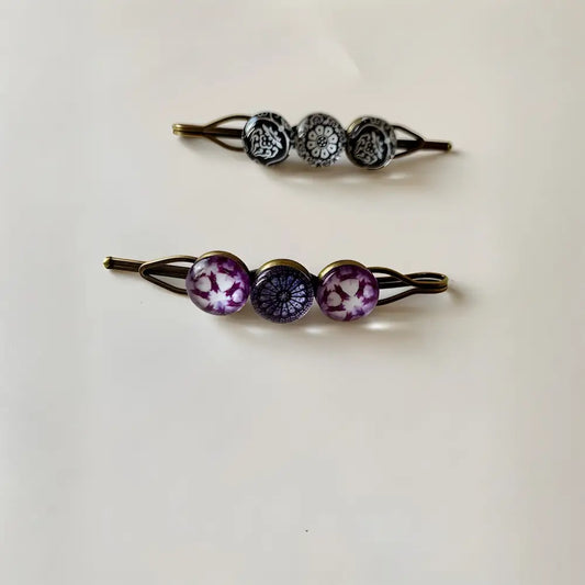 Un ensemble de deux barrettes fait main BOUDUR