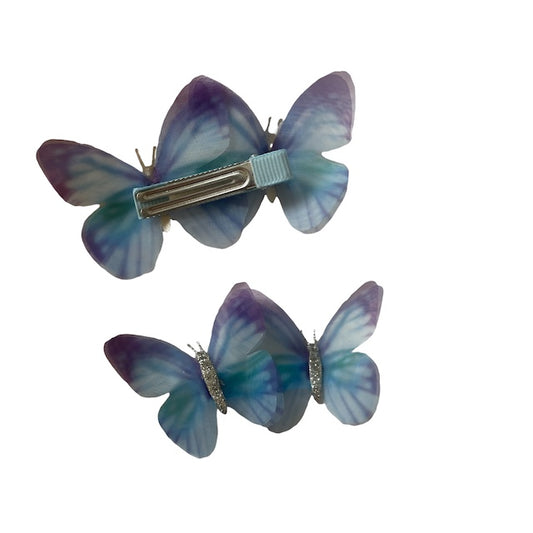 deux barrettes papillons bleu