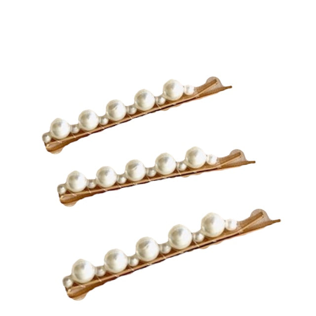 trois barrettes perles blanches